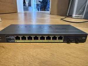 NETGEAR ProSafe 8-Port Gigabit Smart Switch with PoE and Fiber uplink GS110TP - Zdjęcie 1 z 2