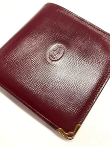 CARTIER VINTAGE MUST CC CARTERA DE CUERO EN RELIEVE MONEDA PLEGABLE FRANCIA ROJO BORGOÑA - Imagen 1 de 24