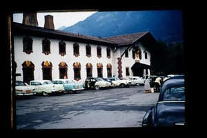 Red Kodachrome 1950s Color 35mm Slide Alpine Hotel Scene with Classic Cars - Picture 1 of 1