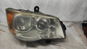 Chrysler Headlight, right with part number 05113340AD - Picture 1 of 4