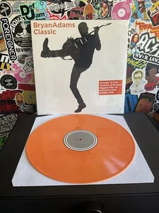 BRYAN ADAMS Classic 2LP VG++ ORANGE VINYL W/HYPE STICKER - Foto 1 di 2