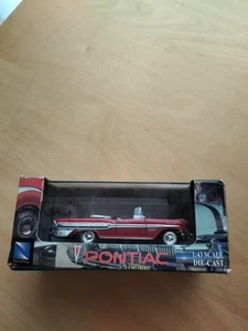 New Ray 1:43 Diecast 1957 Pontiac Bonneville Red - Picture 1 of 6