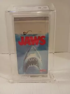 JAWS VHS Graded Beckett 8.0 Seal A 1983 Early Print Brand New Factory Sealed - Foto 1 di 17