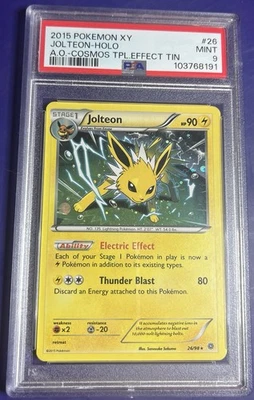 PSA 9 Jolteon 26/98 Cosmos Holo Promo Ancient Origins Triple Effect Tin Pop 21 - Image 1 of 2