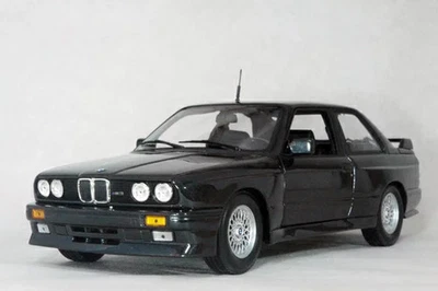 Minichamps 1/18 BMW M3 (E30) 1987 modello pressofuso nero metallizzato - Immagine 1 di 3
