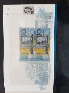 1997 $10 uncut vertical pair in folder blue serials - Picture 1 of 3