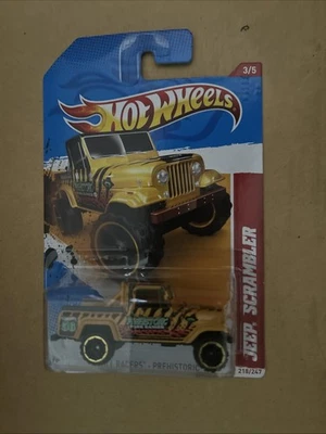 HOT WHEELS JEEP SCRAMBLER 2012 THRILL RACERS PREHISTORIC YELLOW LONG CARD - Image 1 of 2