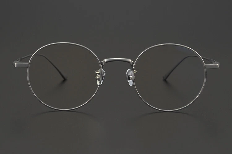 Gafas metálicas de alambre delgado ultraligeras con marco de titanio ovalado redondas plateadas antiguas Foto 1 de 1