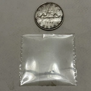 Dólar de plata canadiense 1960 - Imagen 1 de 8