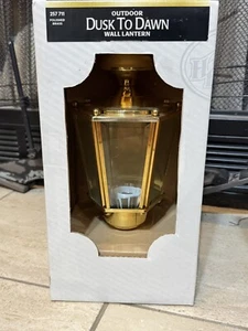 Hampton Bay Outdoor Dusk to Dawn lantern 5-1/2” X 15-1/8” X 5-1/2” brass 257711 - Picture 1 of 4