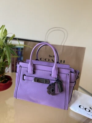 Coach Swagger 27 con floral de sauce  Foto 1 de 4