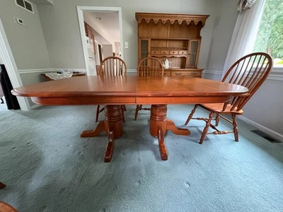 Expandable, solid wood Amish made dining room table set with 10 chairs. - Image 1 of 4