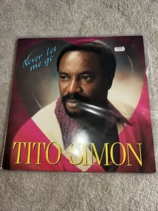 Tito Simon - Never Let Me Go (LP, Album) - Foto 1 di 3