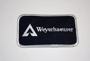 Vintage Weyerhaeuser Lumber & Paper Products Black Cloth Patch New NOS 1970s - Picture 1 of 1