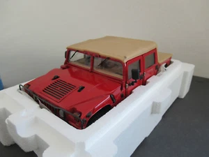 1:18 Exoto Thundet Trac Cabriolet rojo / arena civil - Imagen 1 de 5