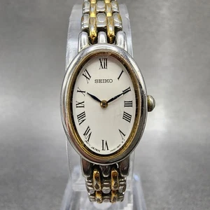Reloj Seiko Mujer 17mm Esfera Blanca Dos Tonos Ovalado V400-1029 Batería Nueva - Imagen 1 de 11