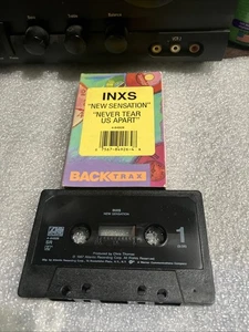 INXS – New Sensation / Never Tear Us Apart CASSETTE  - Picture 1 of 5