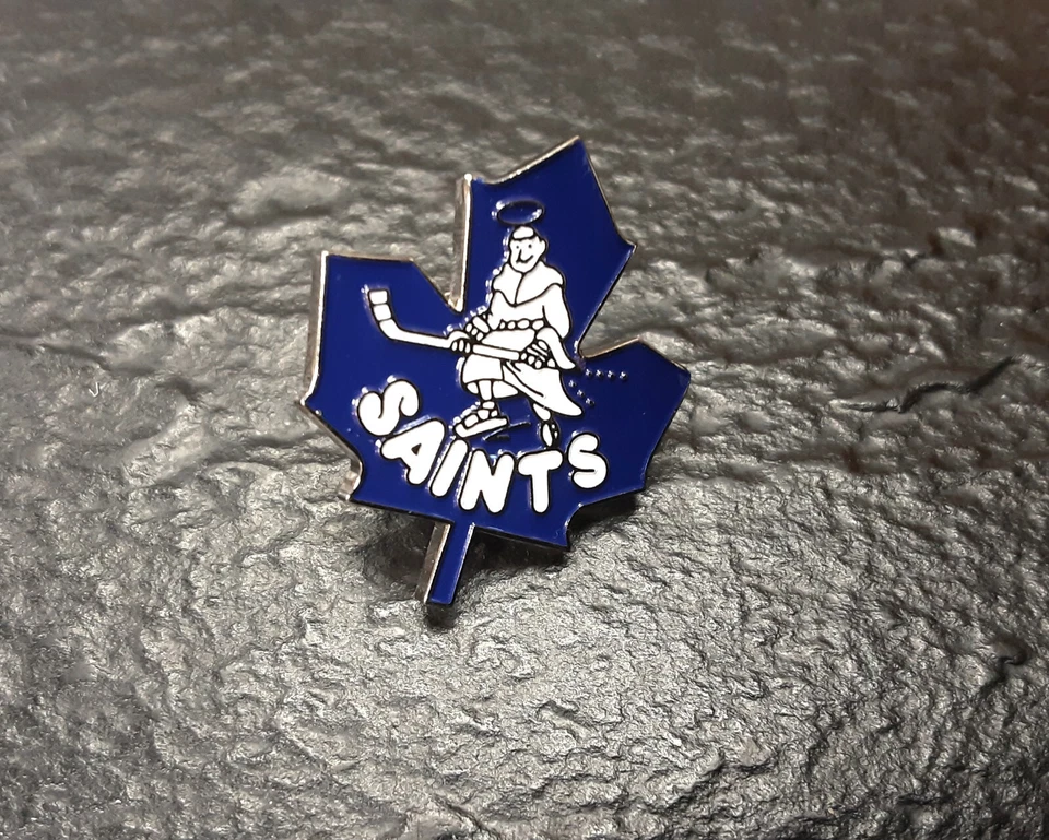 Prendedor vintage Newmarket 1986-1991 Saints AHL por ACE logotipo raro Canadá Foto 1 de 4