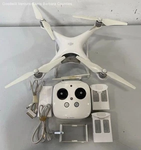 DJI Phantom 4 Camera Drone & Remote Control Model: GL300C-Parts or Repair - Picture 1 of 11