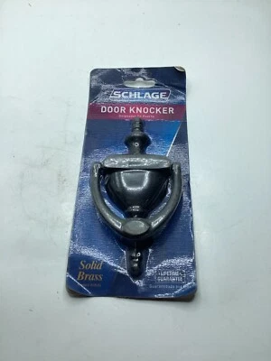 Golpeador de puerta de latón macizo Schlage SC2-3125-716 5-5/16 pulgadas, bronce envejecido Foto 1 de 4