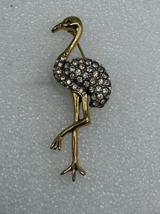 Broche prendedor estilo vintage flamenco pájaro pedrería metal esmalte tono dorado - Imagen 1 de 6