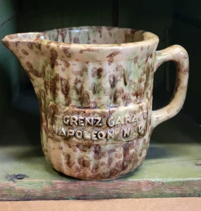 Jarra de esponja publicitaria antigua Grenz Garage Napoleón ND amarilla - Imagen 1 de 8