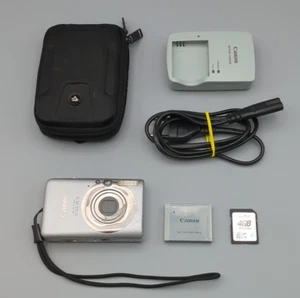 Canon IXUS 95 IS Digital Compact Camera Silver, Official Charger, SD Card, Case - Bild 1 von 24