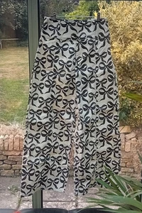 Pantalones de mezclilla We The Free People Spotlight marfil y negro estampado con lazo pierna ancha W 28 10 - Imagen 1 de 3