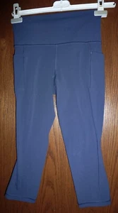 ATHLETA *SALUTATION STASH POCKET II CAPRI in MEDIEVAL VIOLET - PETITE XSP - Picture 1 of 4