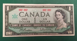 Canadá 1867-1967 emisión centenario uno $1 sin número de serie Reina Isabel 11  - Imagen 1 de 3