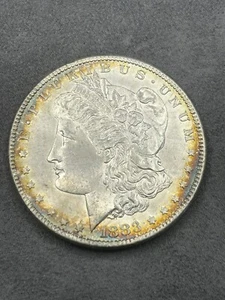 Dólar de plata Morgan 1883-P BU/MS+ tono arco iris y borde excelente - Imagen 1 de 7