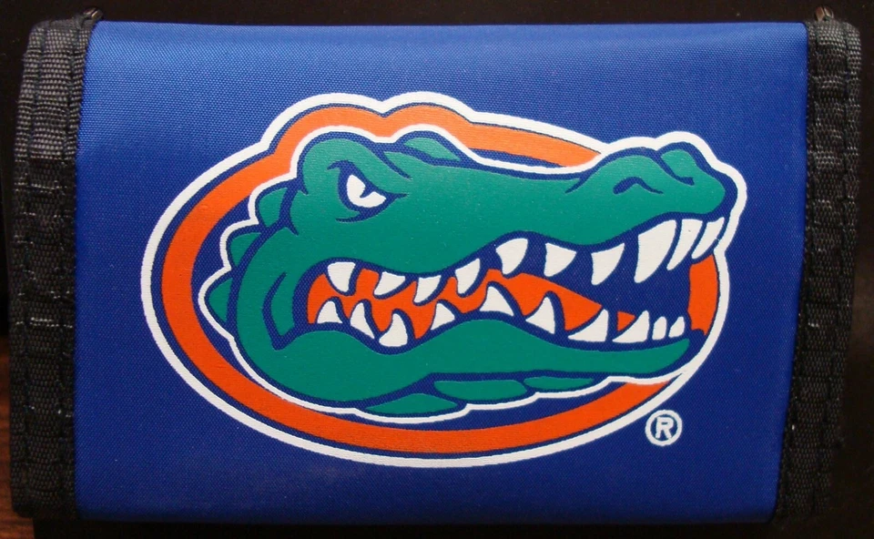 FLORIDA GATORS OFFICIAL TEAM LOGO NYLON TRIFOLD WALLET NEW RICO INDUSTRIES - Image 1 of 1