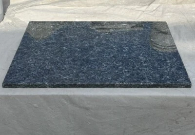 Mesa central grande de granito perla azul Foto 1 de 4