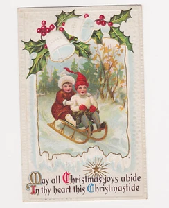 POSTKARTE Weihnachten VINTAGE geprägt Kinder Schlitten Stechpalme metallic - Bild 1 von 2