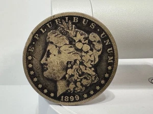 1899 O Morgan Silver Dollar - Picture 1 of 4