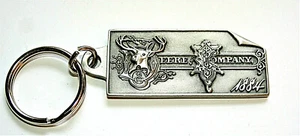 Vintage John Deere Firmenlogo Schlüsselanhänger 2002 NOS 1884 Farm Logo Serie - Bild 1 von 2