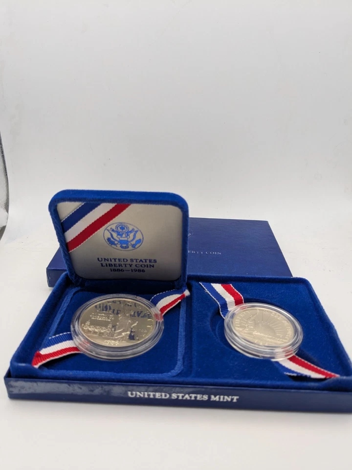 (1) United States Liberty Coins 1886-1986 Silver Dollar & Half Dollar Mint w/COA - Image 1 of 4