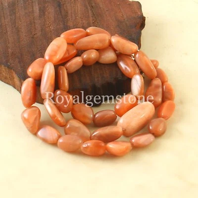 Piedra preciosa de piedra solar natural ardiente piedra solar natural suave ovalada pepita cuentas 180 quilates Foto 1 de 4