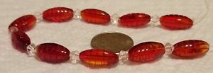 F379 12mm pressed glass oval beads. will combine to save on shipping 