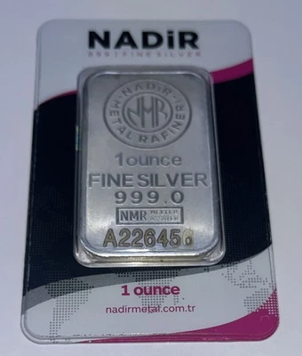 NADIR METAL REFINER BARRA DE PLATA FINA .999 DE UNA ONZA EN TARJETA DE ENSAYO SIN ABRIR Foto 1 de 2