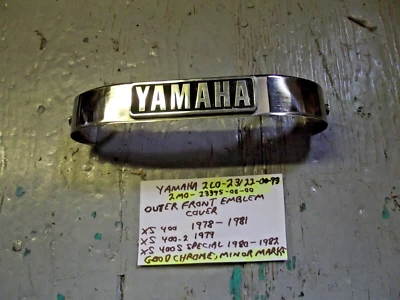 Yamaha  XS400 / XS400-2 / XS400S SPECIAL Front fork cover emblem 2M0-23395-00-00 - Image 1 of 4