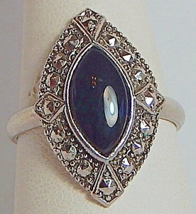 ANILLO IMITACIÓN MARCASITA PLÁSTICO CABINA NEGRA TALLA 8 TONO PLATEADO - Imagen 1 de 4