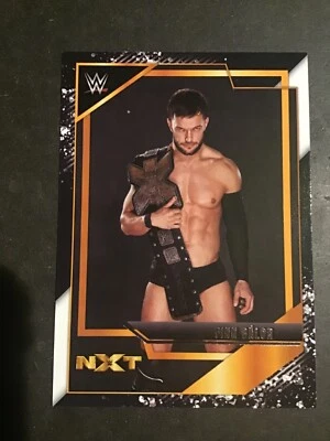 2022 Panini WWE NXT Finn Balor NXT Gold Set Insert - Image 1 of 4