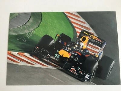 Sebastian Vettel signed Red Bull F1 A4 photo - Image 1 of 2