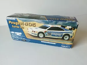 Nikko Peugeot 405 Turbo 16 radiocommandée TBE - Photo 1 sur 23