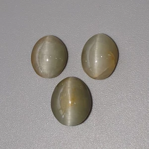 14.00cts Quartz Cat's Eye Gemstone Oval Shape Cabochon 11*9mm - 12*10mm 3pcs Set - Picture 1 of 6