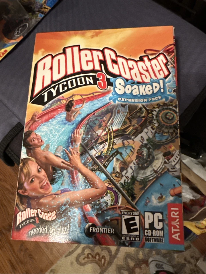 2005 Roller Coaster Tycoon 3 PC Game + Soaked Expansion Pack Atari 98/XP/2000 - Image 1 of 1