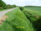Photo 12X8 Ditch At The Side Of A Country Road This View Looks Towards Bel C2011