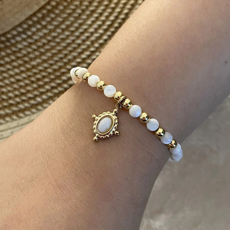 Ellipse Geometric Natural Stone Handmade Bracelets White Shell with Gold Accents - Image 1 of 1