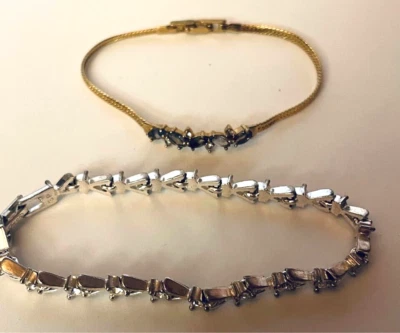 PAR de pulseras de tenis con diamantes de imitación AVON 1 gemas transparentes tono dorado ahumado 1 tono plata Foto 1 de 3